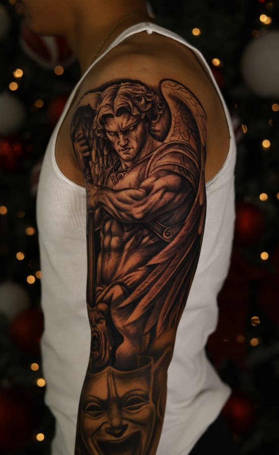 Woman in a luchador mask, black and grey realism tattoo on a shoulder