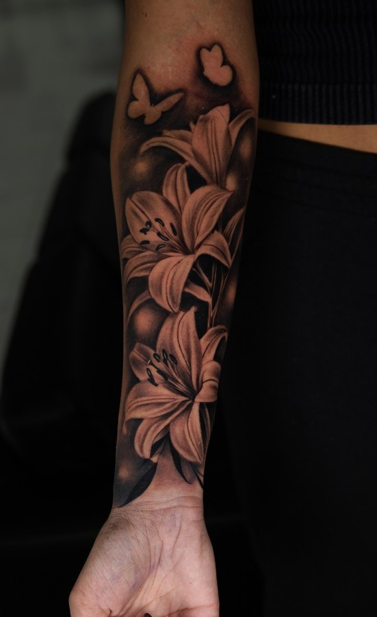 Warrior woman with braids, a barn owl and an axe, black and grey realism upper arm sleeve
